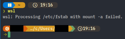 修正前の実画面。PowerShellからwslを実行すると、Processing /etc/fstab with mount -a failed.と表示され、その下にUbuntuのプロンプトが出ている。